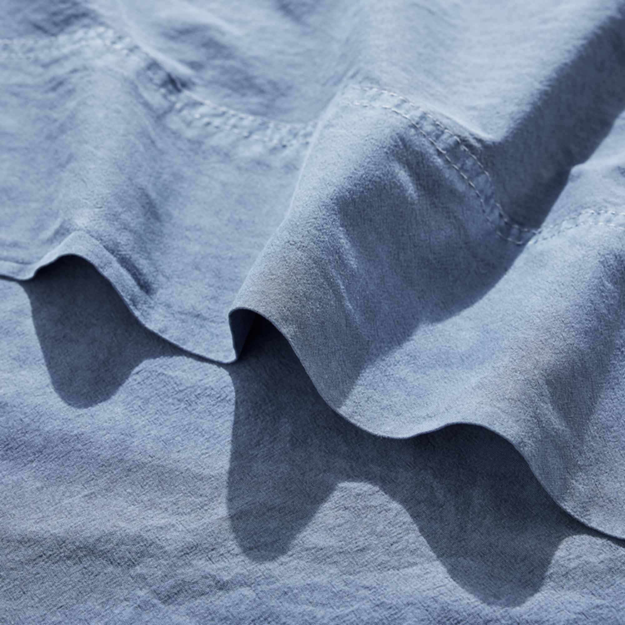 Royal Doulton Nelson Denim sheet fabric close-up with a folded hem