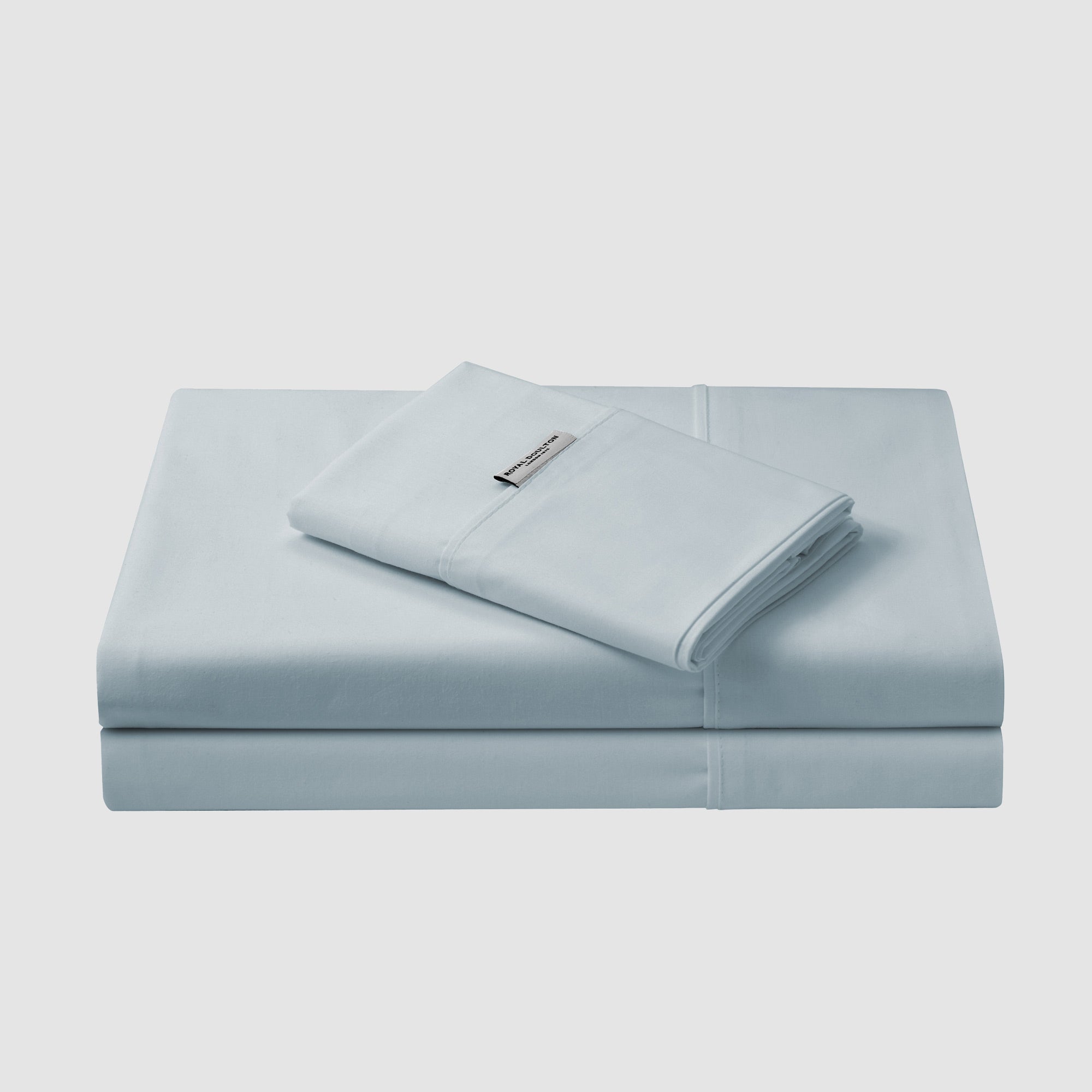 Royal Doulton Stirling Sky flat sheet folded with a matching sheet stack