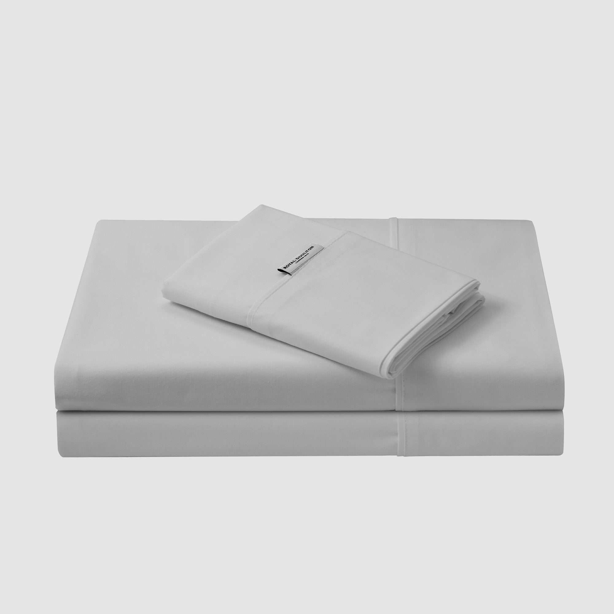Royal Doulton Stirling Stone flat sheet folded with a matching sheet stack