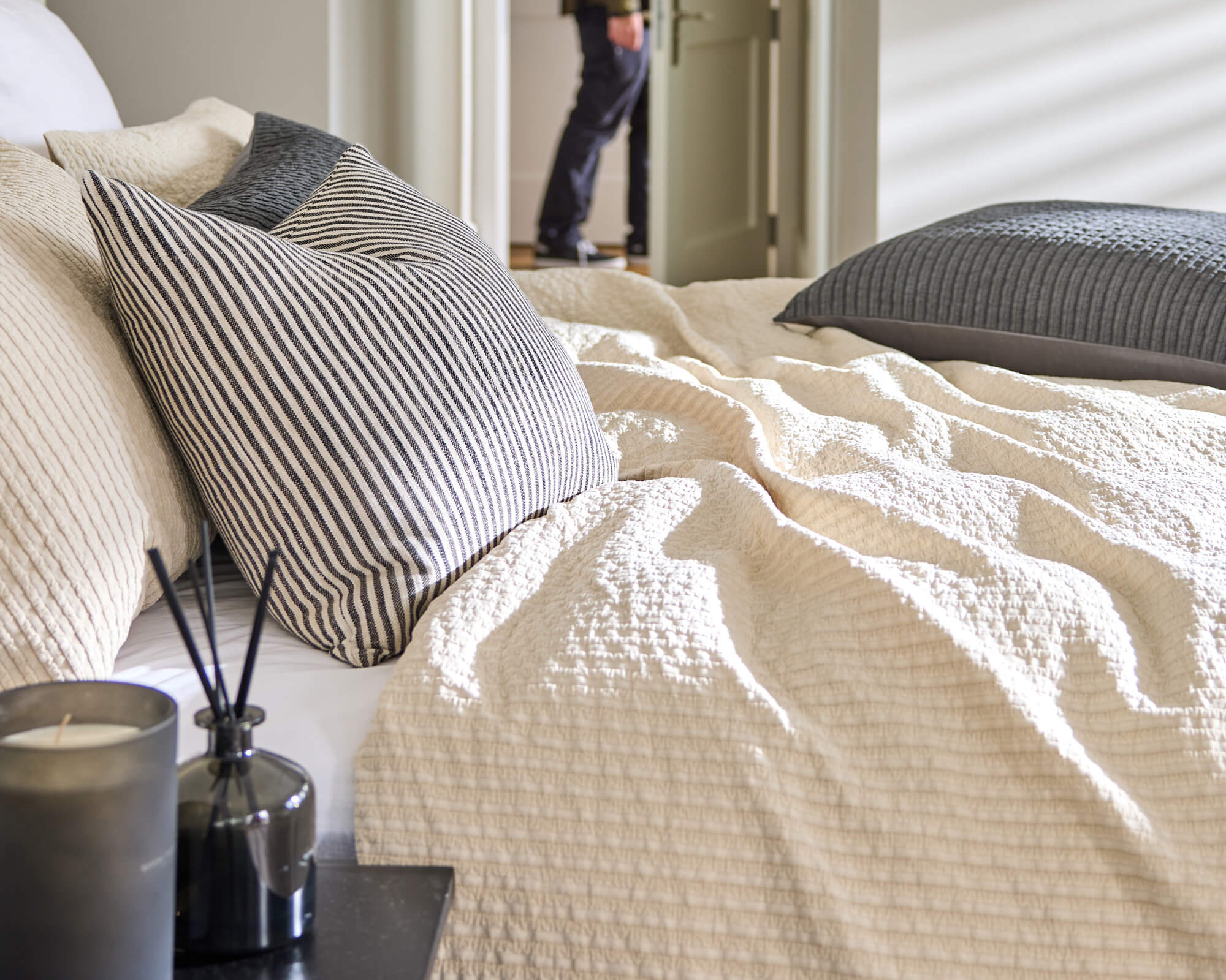 Royal Doulton Halston ivory textured duvet cover with striped pillows