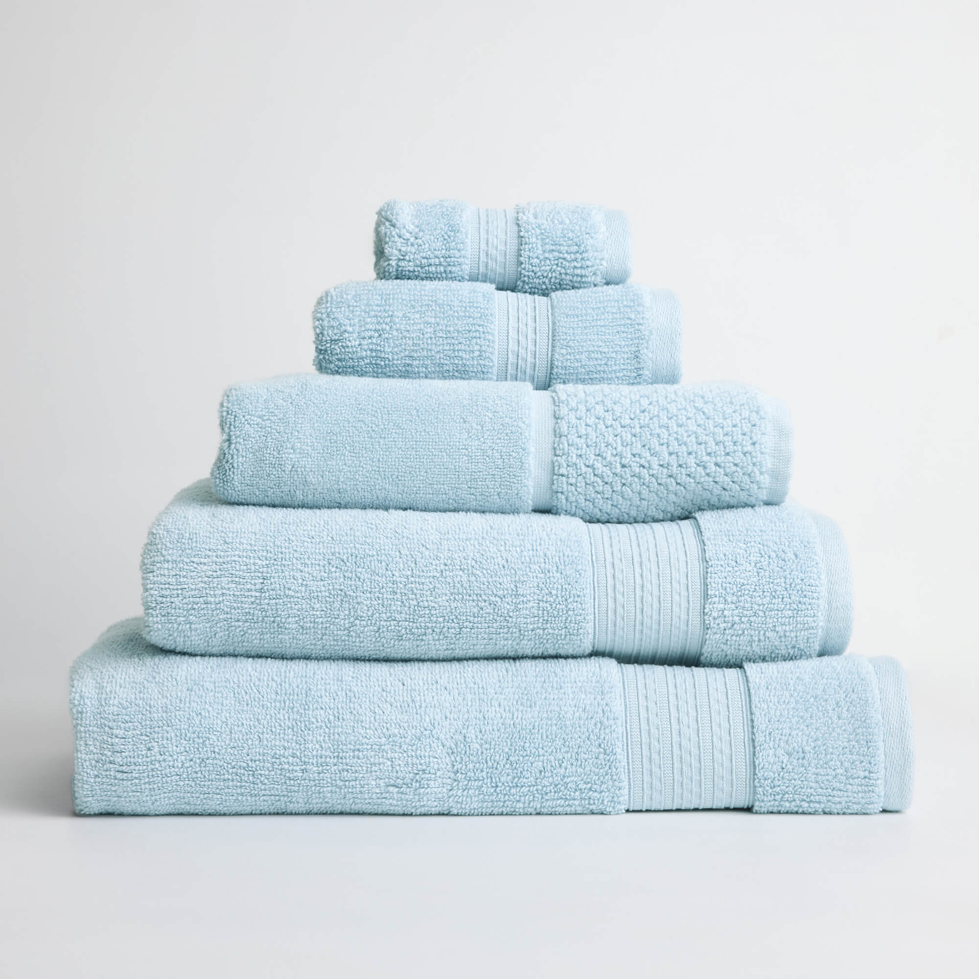 Royal Doulton Harlow Powder Blue towel set stacked on a white background
