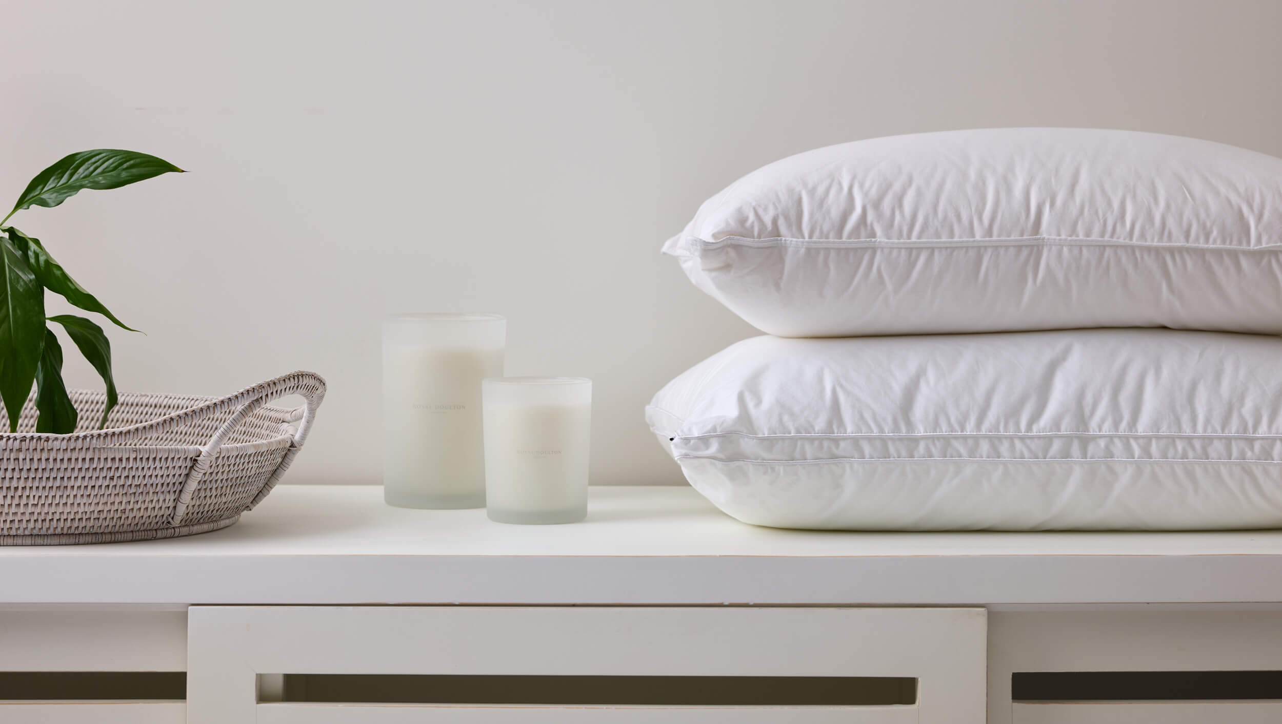 Royal Doulton pillow inners styled on a bed