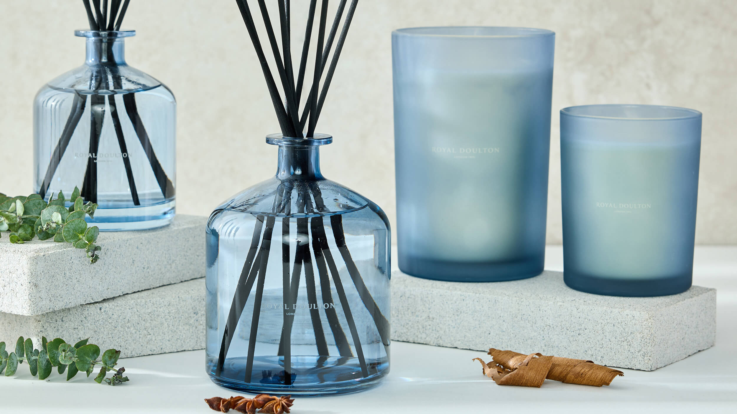 Royal Doulton Montclair blue glass diffusers and candles with eucalyptus and spices