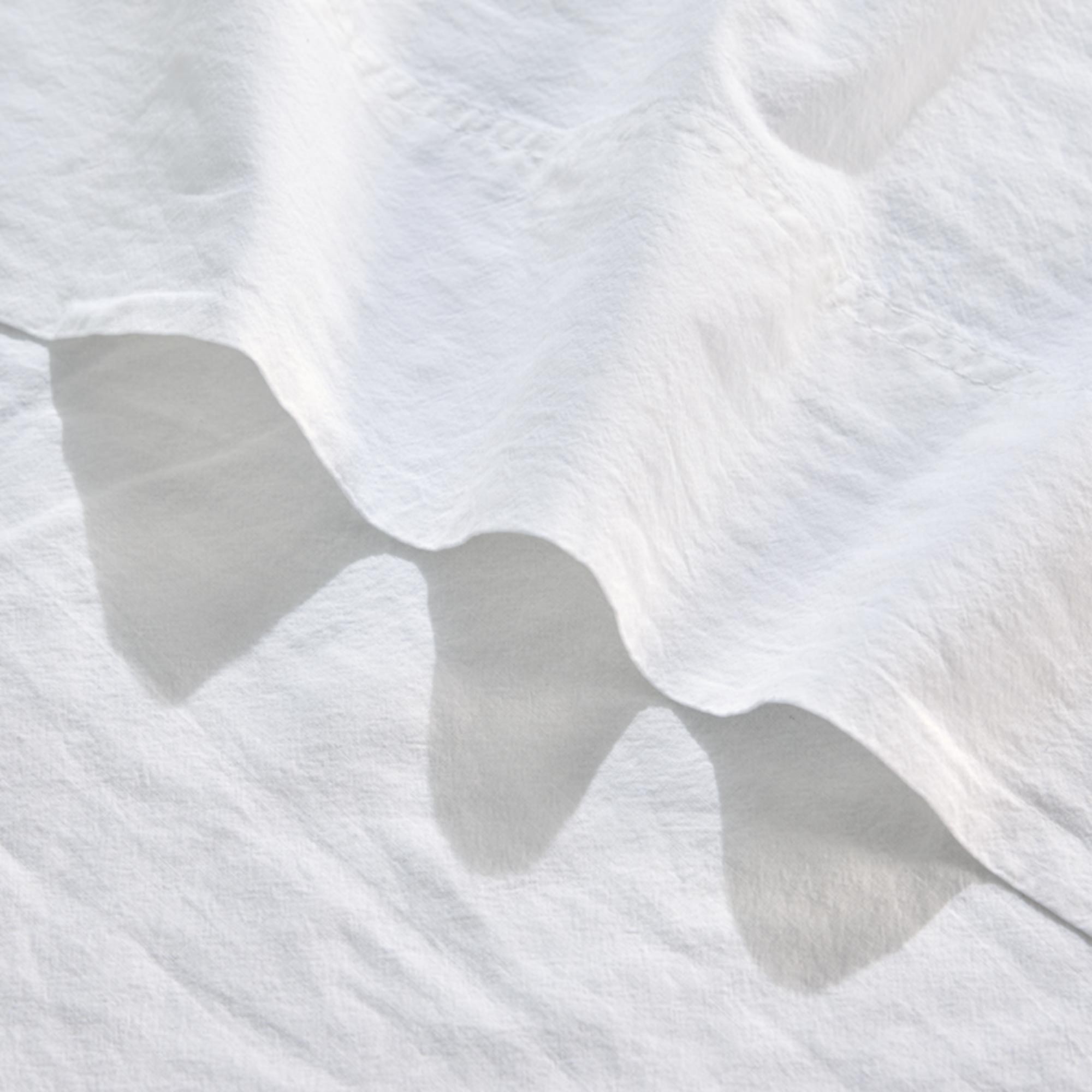 Royal Doulton Nelson White sheet fabric close-up with a folded hem