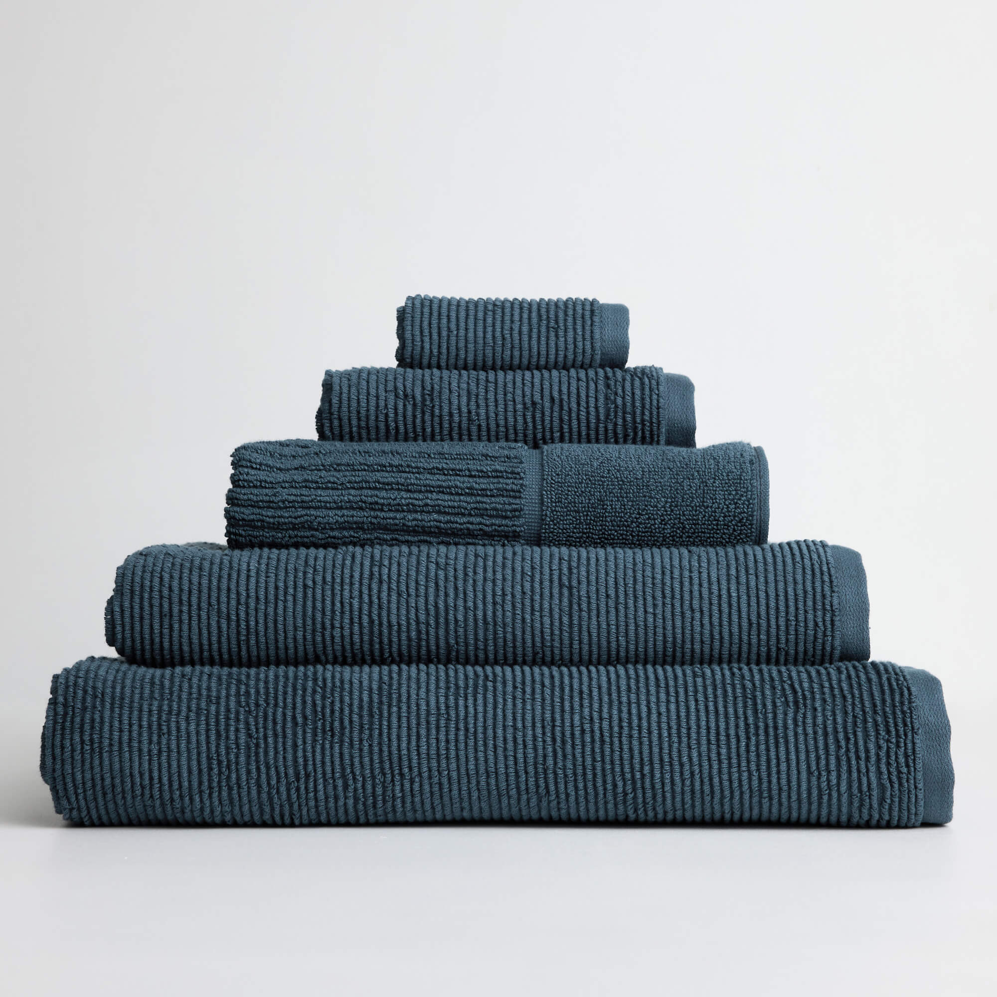 Royal Doulton Eden ribbed towel set stacked in Midnight