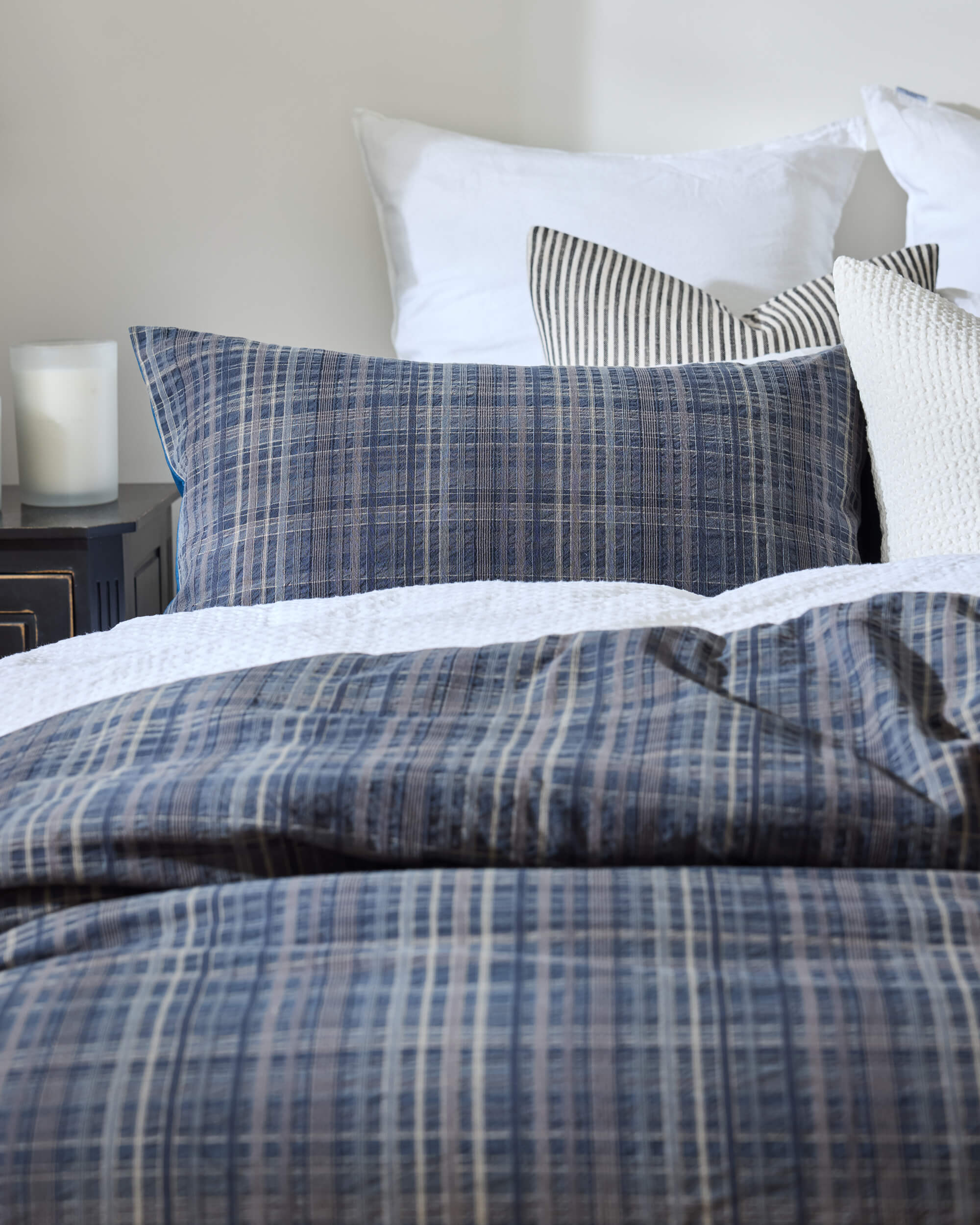 Royal Doulton Devon blue checked duvet cover and pillows on a bed